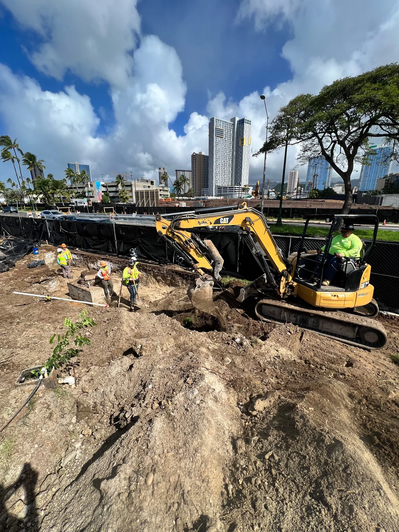 Excavation and utility coordination within the dense urban work zone.