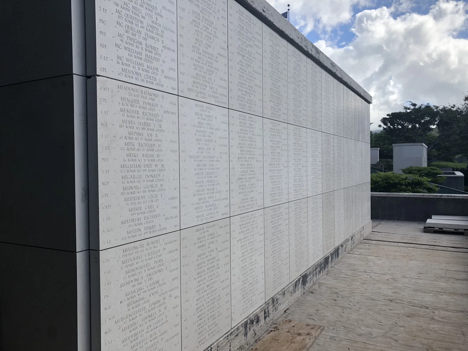Engraved memorial wall panels at the Courts of the Missing.