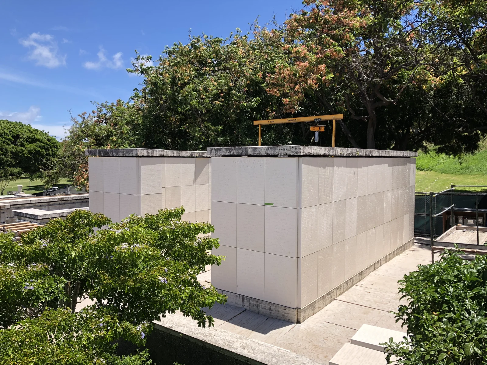 Memorial wall construction carefully integrated into the Punchbowl grounds.