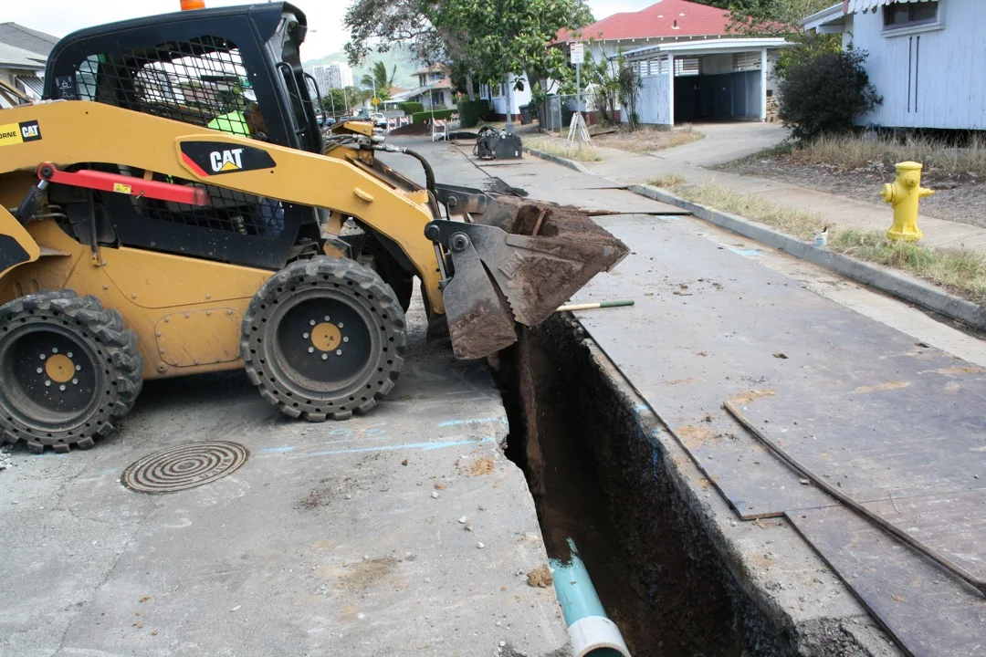 MIRA crew installing waterline infrastructure in Kapahulu.