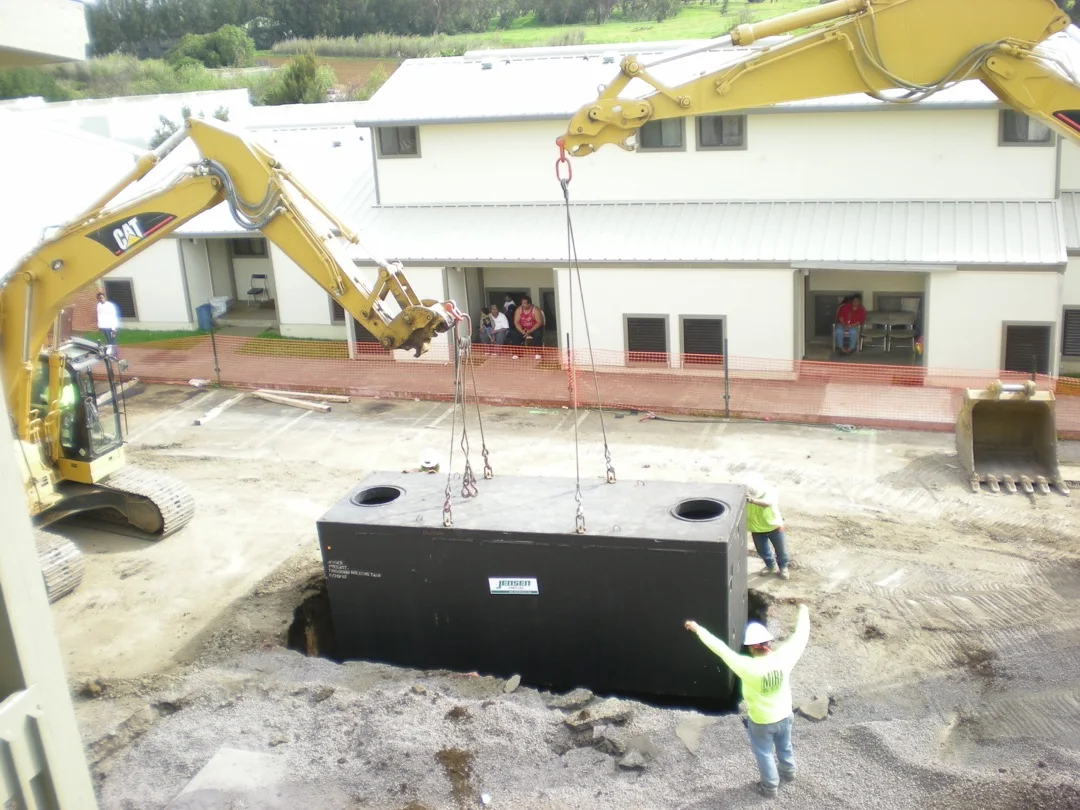 Septic tank installation supporting the Noelani housing community.
