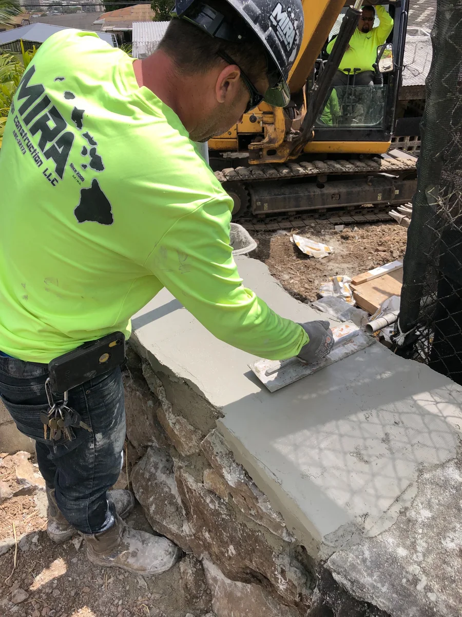 Crew completing concrete work as part of the Papakōlea sewer improvements.