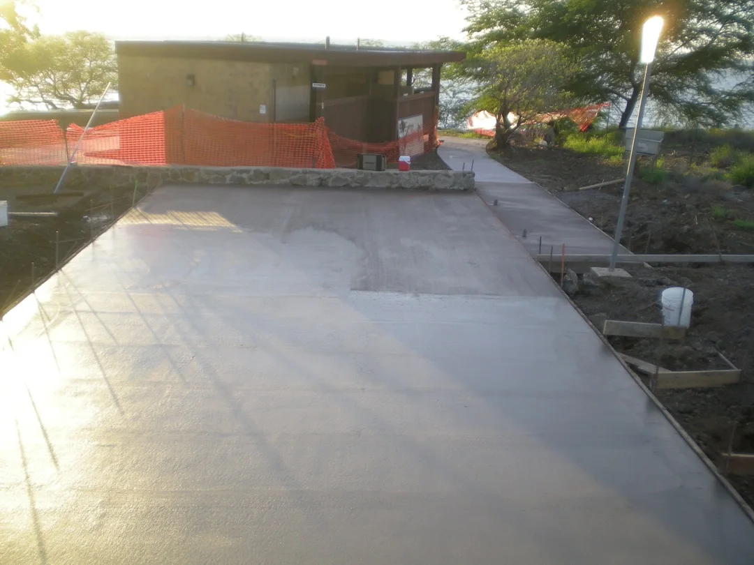 MIRA crew completing new concrete amenities at the beach park.